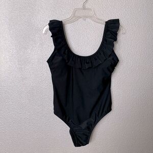 SUGAR Coast one-piece swimsuit features a ruffled plunging neckline